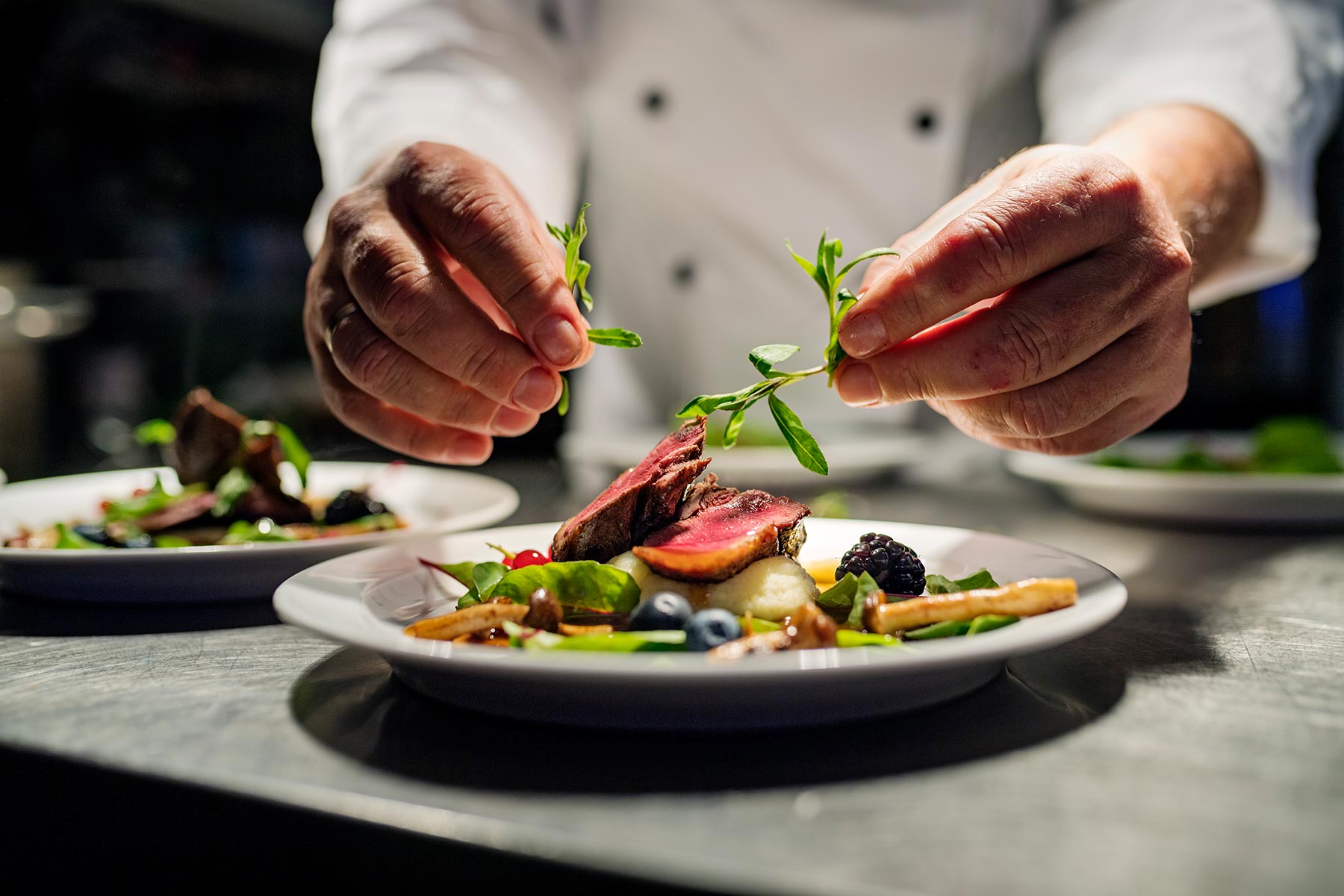 Chef preparing dish